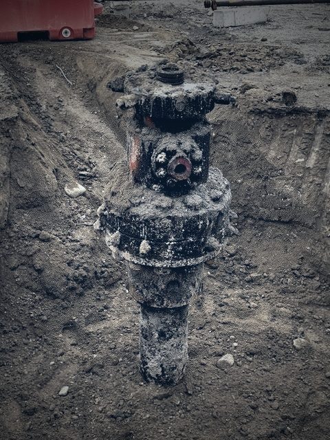 Wellhead valve stack at a marginal well site